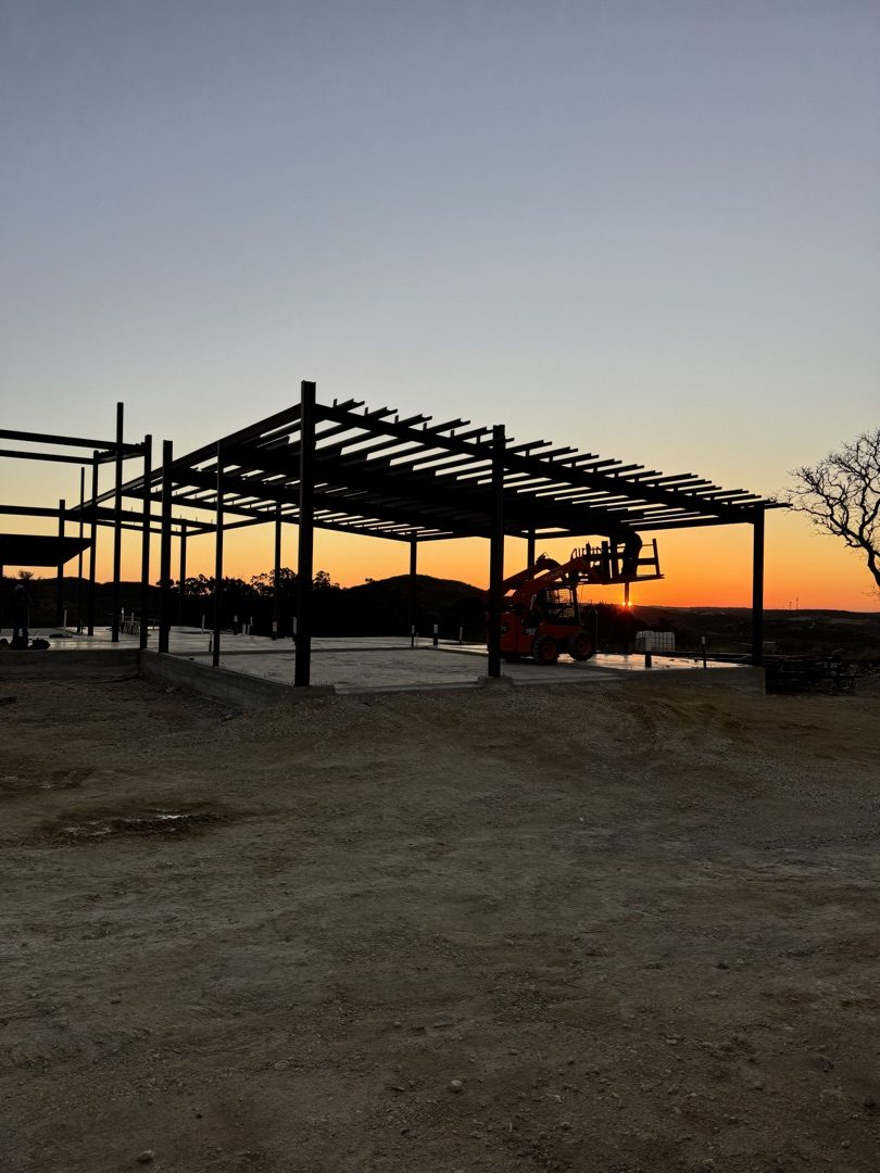 Steel erecting at sunset, Spring Branch area